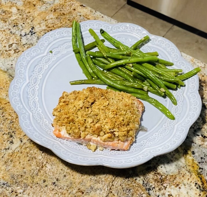 plate with walnut crusted salmon and string beans