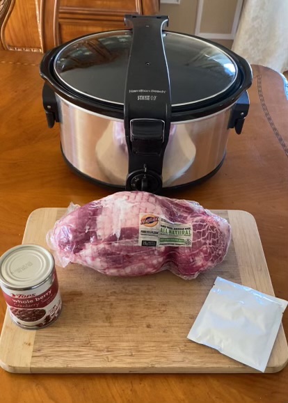 pork shoulder, cranberry sauce, onion soup mix packet, and crockpot