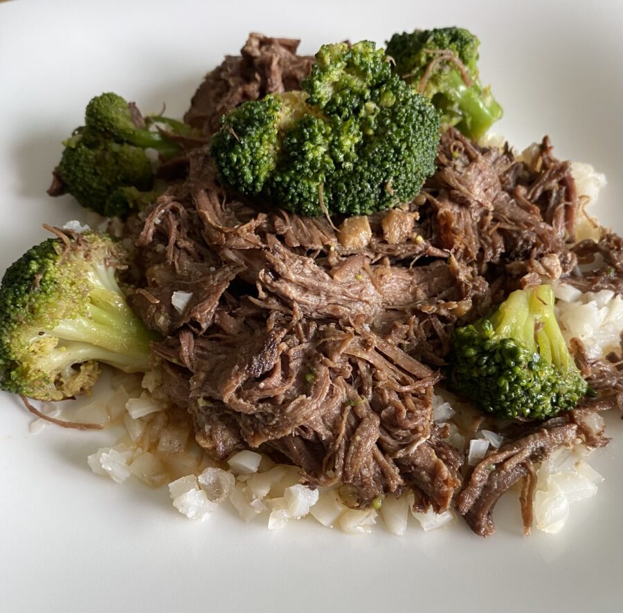 plate with cooked rice, beef, and broccoli